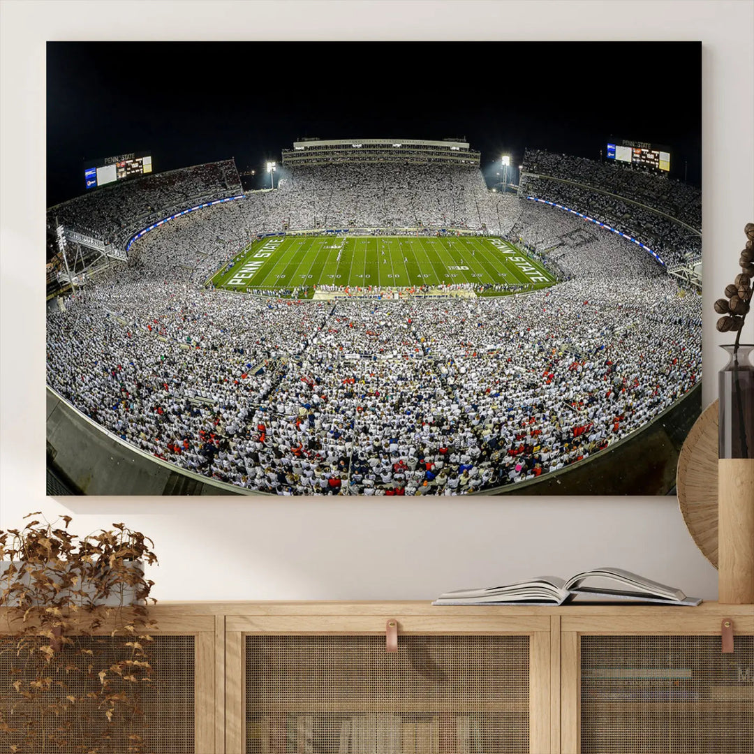 The Beaver Stadium Night Game Triple Canvas Wall Art - Penn State Nittany Lions Football Match features a panoramic view of a packed Beaver Stadium at night.