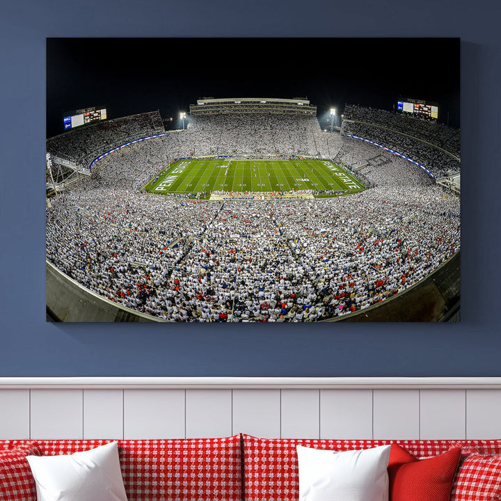 The Beaver Stadium Night Game Triple Canvas Wall Art - Penn State Nittany Lions Football Match features a panoramic view of a packed Beaver Stadium at night.