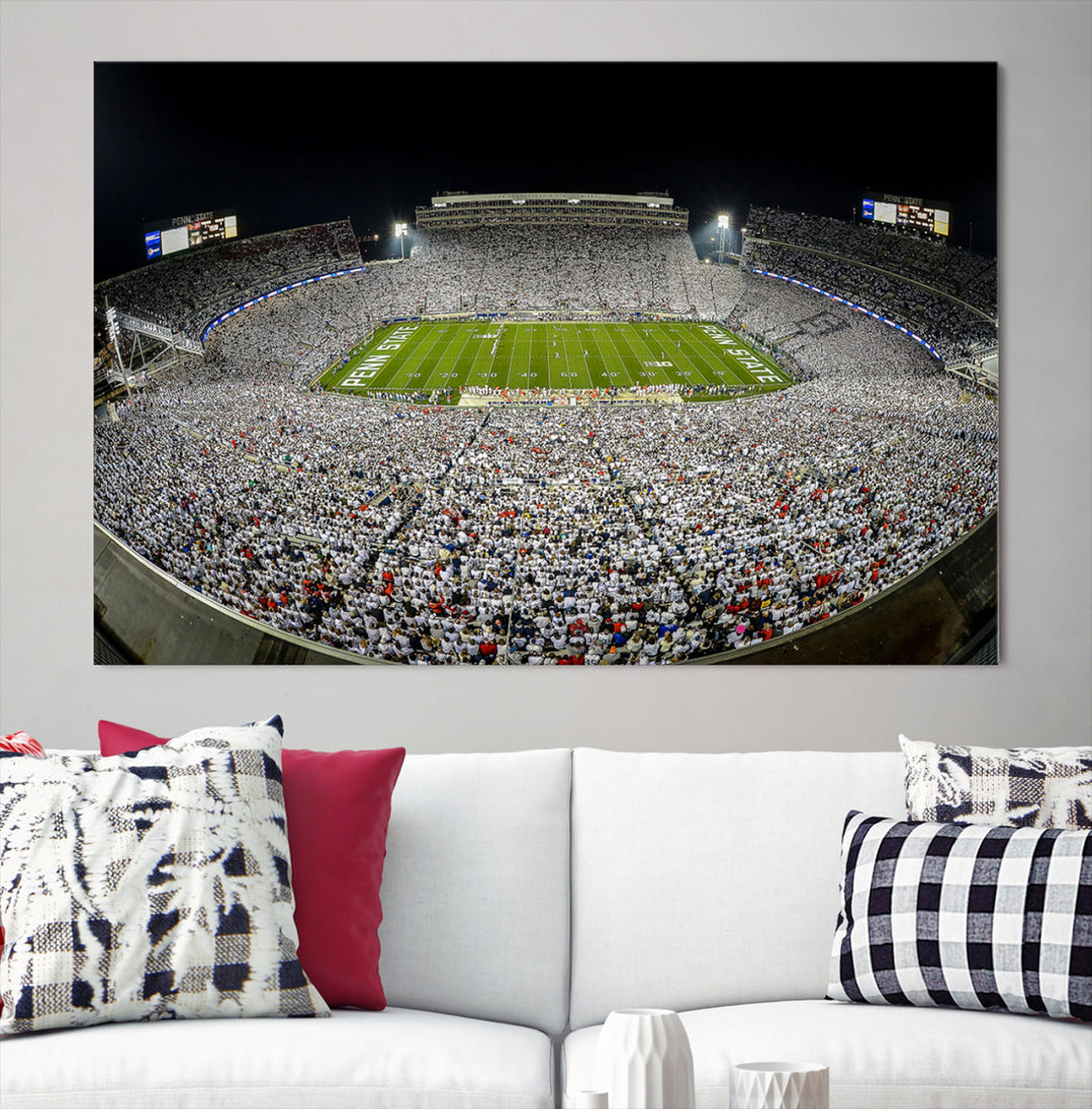 The Beaver Stadium Night Game Triple Canvas Wall Art - Penn State Nittany Lions Football Match features a panoramic view of a packed Beaver Stadium at night.