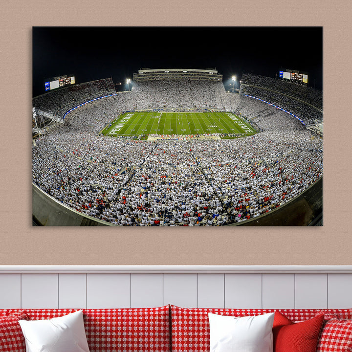 The Beaver Stadium Night Game Triple Canvas Wall Art - Penn State Nittany Lions Football Match features a panoramic view of a packed Beaver Stadium at night.