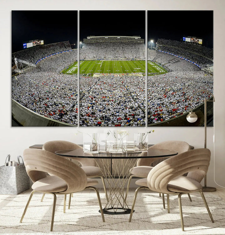 The Beaver Stadium Night Game Triple Canvas Wall Art - Penn State Nittany Lions Football Match features a panoramic view of a packed Beaver Stadium at night.