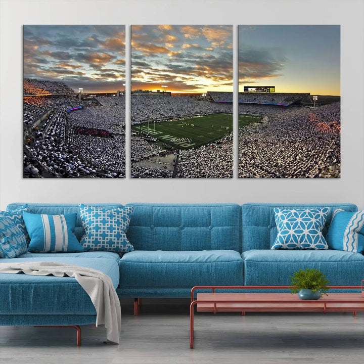 The living room features a beautifully decorated triptych of Beaver Stadium Wall Art, depicting the Penn Nittany Lions football match and capturing the vibrant energy of fans.