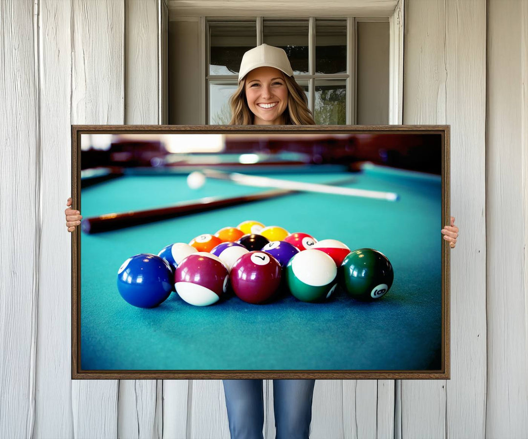 The Billiard Balls Pool Table Wall Art, a handmade piece, features cues on a blue table.