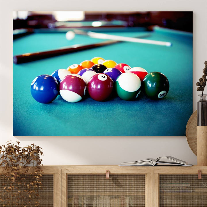 The Billiard Balls Pool Table Wall Art, a handmade piece, features cues on a blue table.