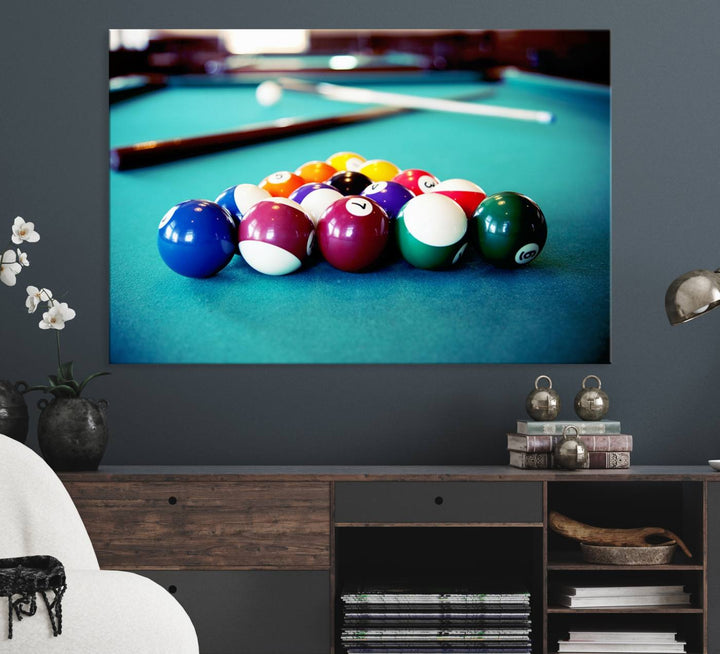 The Billiard Balls Pool Table Wall Art, a handmade piece, features cues on a blue table.