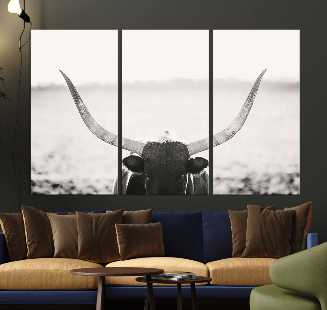 A captivating Black and White Longhorn Wall Art, featuring a triptych of a bull with impressive horns, perfectly suits those who admire Western Longhorn Canvas Prints. This ready-to-hang and framed piece beautifully merges farmhouse wall art with contemporary style.