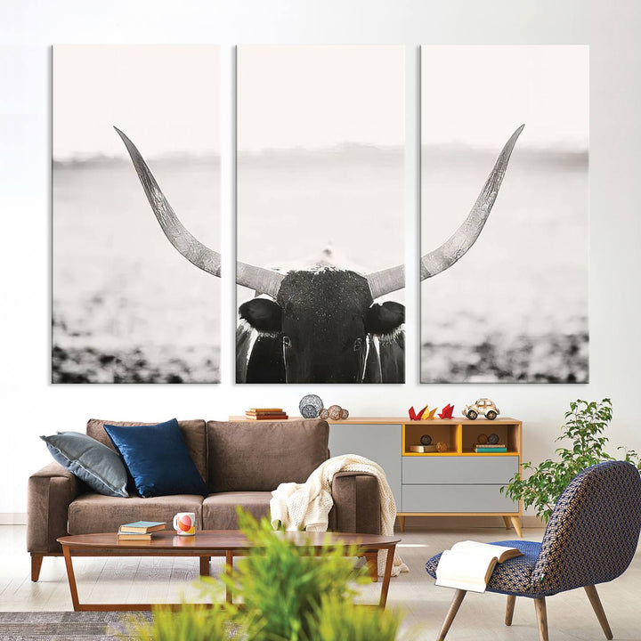 A captivating Black and White Longhorn Wall Art, featuring a triptych of a bull with impressive horns, perfectly suits those who admire Western Longhorn Canvas Prints. This ready-to-hang and framed piece beautifully merges farmhouse wall art with contemporary style.