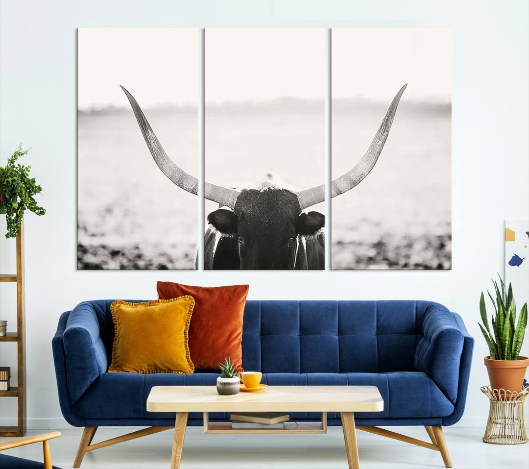 A captivating Black and White Longhorn Wall Art, featuring a triptych of a bull with impressive horns, perfectly suits those who admire Western Longhorn Canvas Prints. This ready-to-hang and framed piece beautifully merges farmhouse wall art with contemporary style.