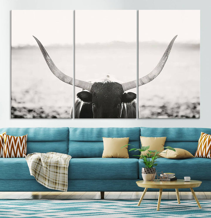 A captivating Black and White Longhorn Wall Art, featuring a triptych of a bull with impressive horns, perfectly suits those who admire Western Longhorn Canvas Prints. This ready-to-hang and framed piece beautifully merges farmhouse wall art with contemporary style.