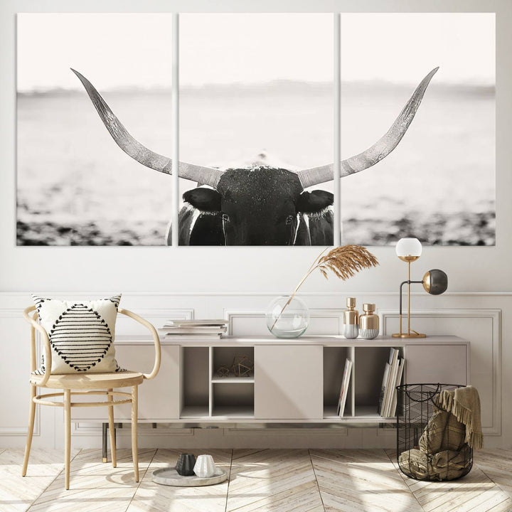 A captivating Black and White Longhorn Wall Art, featuring a triptych of a bull with impressive horns, perfectly suits those who admire Western Longhorn Canvas Prints. This ready-to-hang and framed piece beautifully merges farmhouse wall art with contemporary style.