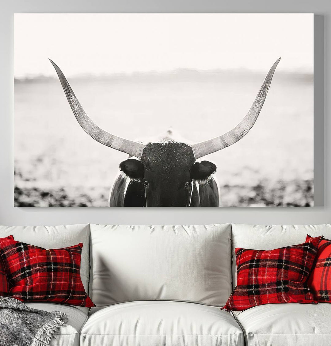 A captivating Black and White Longhorn Wall Art, featuring a triptych of a bull with impressive horns, perfectly suits those who admire Western Longhorn Canvas Prints. This ready-to-hang and framed piece beautifully merges farmhouse wall art with contemporary style.