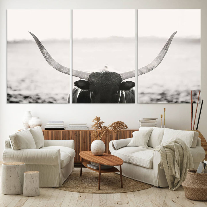 A captivating Black and White Longhorn Wall Art, featuring a triptych of a bull with impressive horns, perfectly suits those who admire Western Longhorn Canvas Prints. This ready-to-hang and framed piece beautifully merges farmhouse wall art with contemporary style.