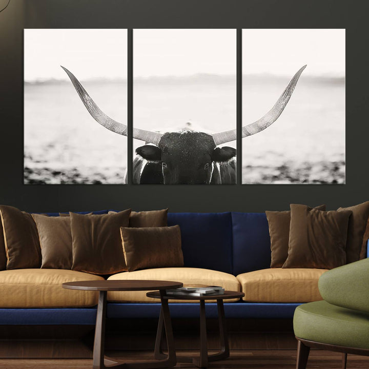 A captivating Black and White Longhorn Wall Art, featuring a triptych of a bull with impressive horns, perfectly suits those who admire Western Longhorn Canvas Prints. This ready-to-hang and framed piece beautifully merges farmhouse wall art with contemporary style.