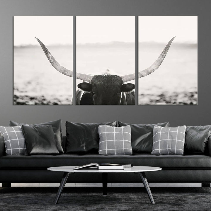 A captivating Black and White Longhorn Wall Art, featuring a triptych of a bull with impressive horns, perfectly suits those who admire Western Longhorn Canvas Prints. This ready-to-hang and framed piece beautifully merges farmhouse wall art with contemporary style.