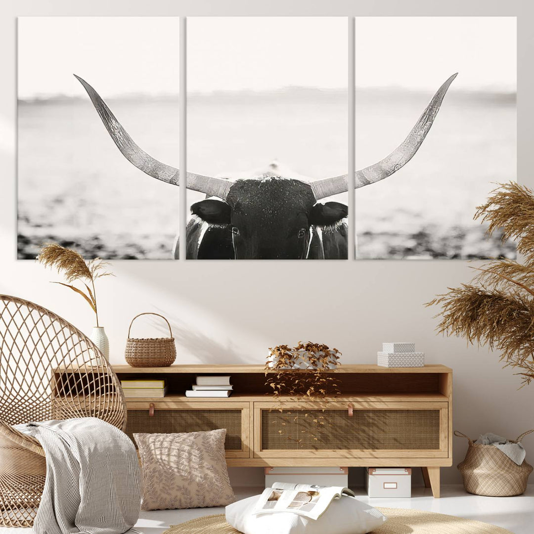 A captivating Black and White Longhorn Wall Art, featuring a triptych of a bull with impressive horns, perfectly suits those who admire Western Longhorn Canvas Prints. This ready-to-hang and framed piece beautifully merges farmhouse wall art with contemporary style.