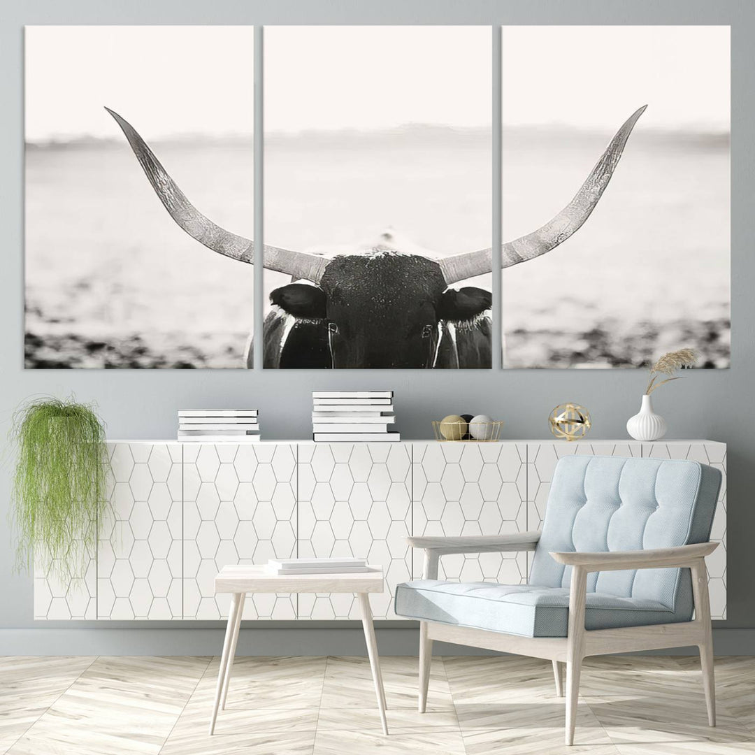 A captivating Black and White Longhorn Wall Art, featuring a triptych of a bull with impressive horns, perfectly suits those who admire Western Longhorn Canvas Prints. This ready-to-hang and framed piece beautifully merges farmhouse wall art with contemporary style.