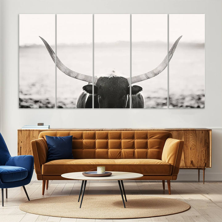 A captivating Black and White Longhorn Wall Art, featuring a triptych of a bull with impressive horns, perfectly suits those who admire Western Longhorn Canvas Prints. This ready-to-hang and framed piece beautifully merges farmhouse wall art with contemporary style.