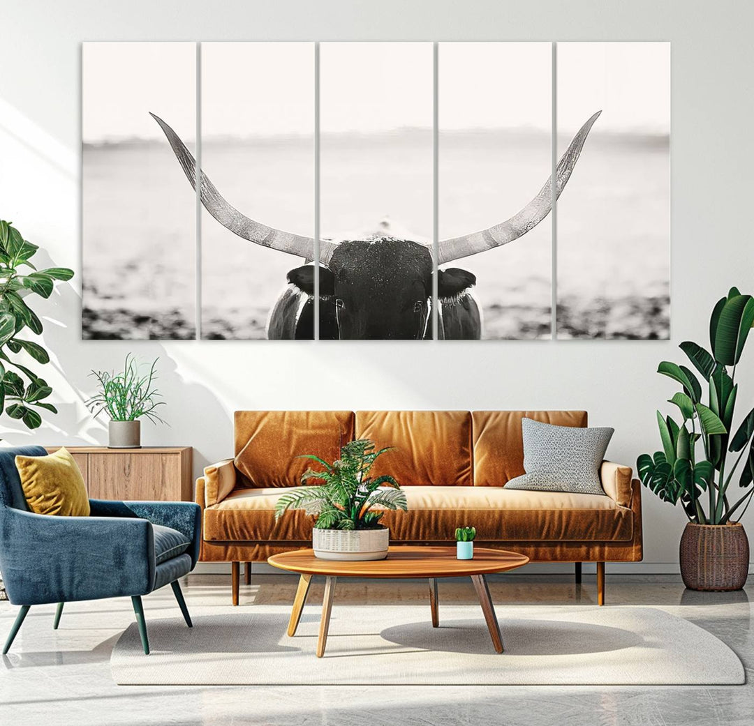 A captivating Black and White Longhorn Wall Art, featuring a triptych of a bull with impressive horns, perfectly suits those who admire Western Longhorn Canvas Prints. This ready-to-hang and framed piece beautifully merges farmhouse wall art with contemporary style.