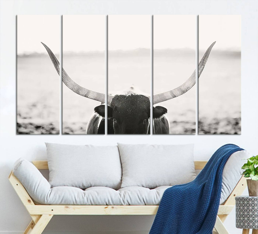 A captivating Black and White Longhorn Wall Art, featuring a triptych of a bull with impressive horns, perfectly suits those who admire Western Longhorn Canvas Prints. This ready-to-hang and framed piece beautifully merges farmhouse wall art with contemporary style.