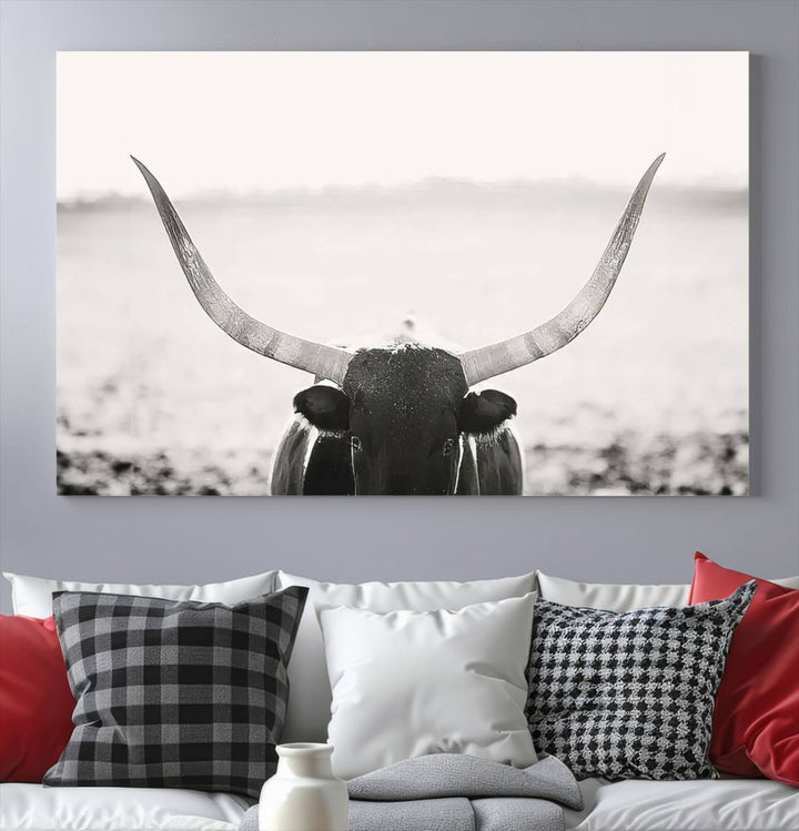 A captivating Black and White Longhorn Wall Art, featuring a triptych of a bull with impressive horns, perfectly suits those who admire Western Longhorn Canvas Prints. This ready-to-hang and framed piece beautifully merges farmhouse wall art with contemporary style.