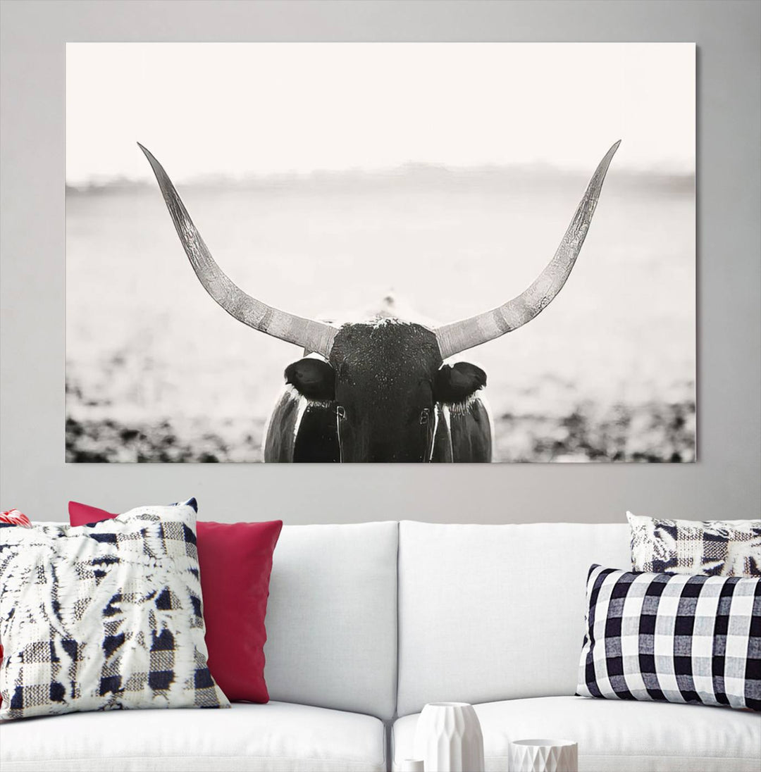 A captivating Black and White Longhorn Wall Art, featuring a triptych of a bull with impressive horns, perfectly suits those who admire Western Longhorn Canvas Prints. This ready-to-hang and framed piece beautifully merges farmhouse wall art with contemporary style.