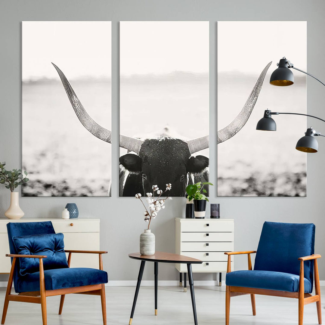 A captivating Black and White Longhorn Wall Art, featuring a triptych of a bull with impressive horns, perfectly suits those who admire Western Longhorn Canvas Prints. This ready-to-hang and framed piece beautifully merges farmhouse wall art with contemporary style.