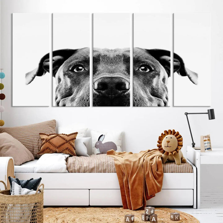 The "Black and White Pit Bull Dog Wall Art Canvas Print" elegantly adorns the living room, infusing character and charm into the contemporary setting. This captivating piece is perfect for dog lovers.