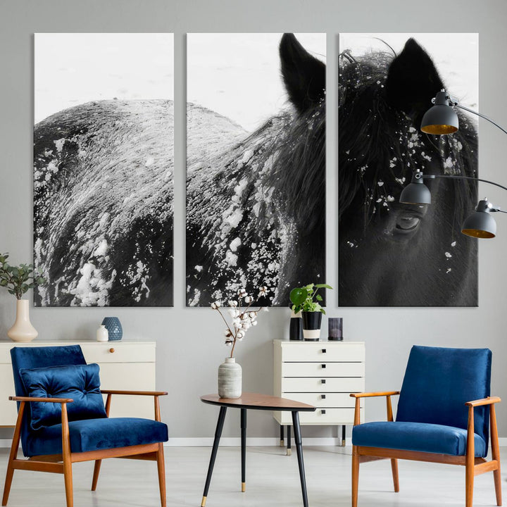 The "Black Horse in Snow Canvas Print" serves as an ideal rustic cabin wall art centerpiece with its triptych design of a snowy black horse.