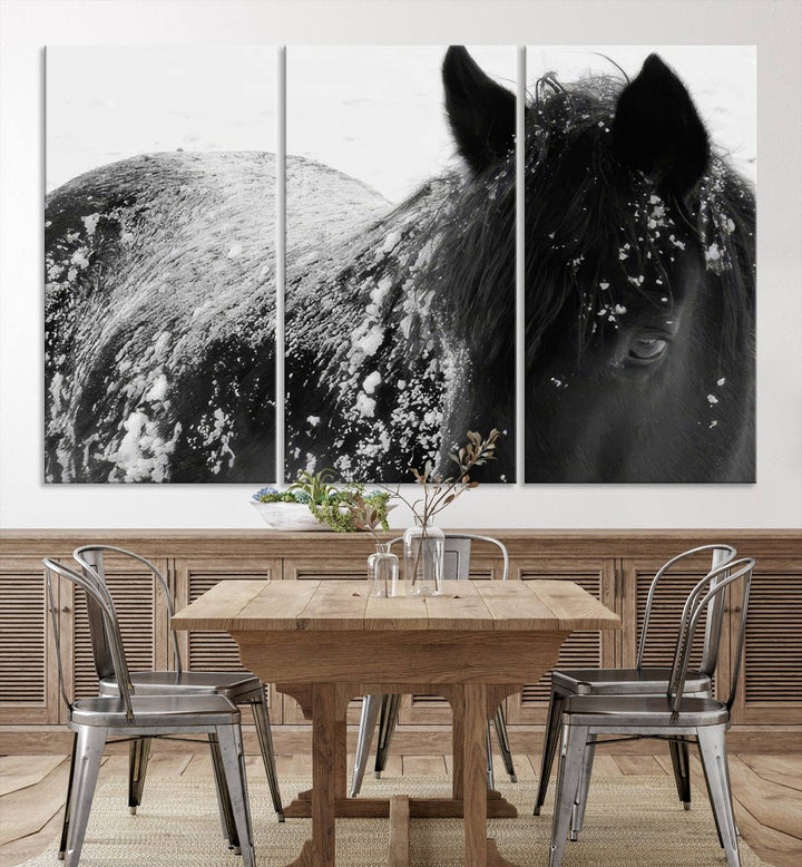 The "Black Horse in Snow Canvas Print" serves as an ideal rustic cabin wall art centerpiece with its triptych design of a snowy black horse.