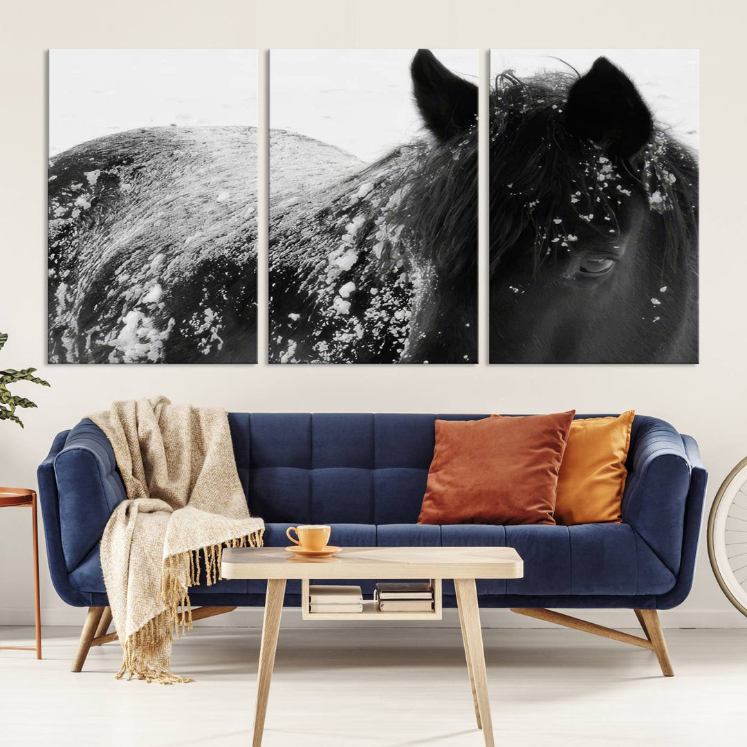 The "Black Horse in Snow Canvas Print" serves as an ideal rustic cabin wall art centerpiece with its triptych design of a snowy black horse.