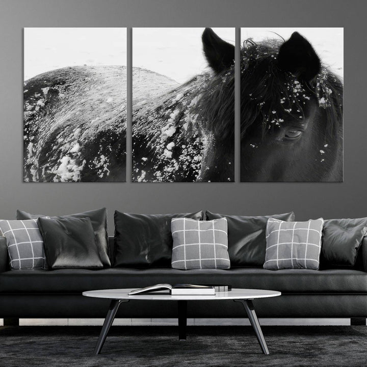 The "Black Horse in Snow Canvas Print" serves as an ideal rustic cabin wall art centerpiece with its triptych design of a snowy black horse.