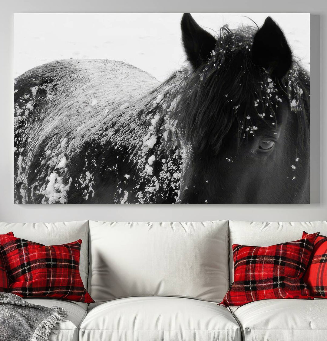 The "Black Horse in Snow Canvas Print" serves as an ideal rustic cabin wall art centerpiece with its triptych design of a snowy black horse.