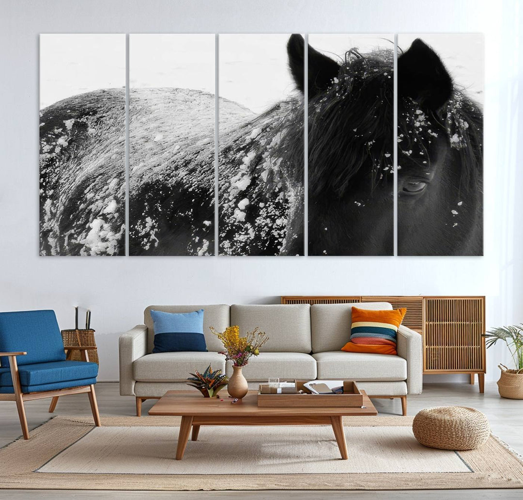 The "Black Horse in Snow Canvas Print" serves as an ideal rustic cabin wall art centerpiece with its triptych design of a snowy black horse.