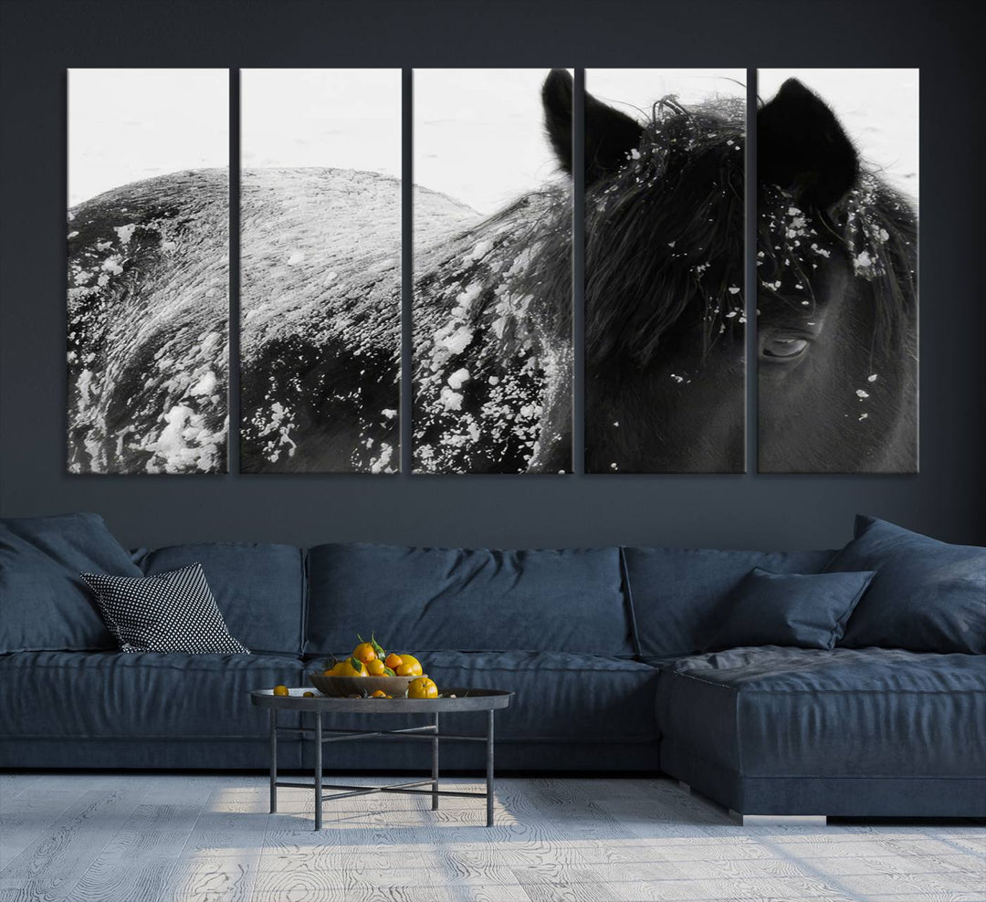 The "Black Horse in Snow Canvas Print" serves as an ideal rustic cabin wall art centerpiece with its triptych design of a snowy black horse.