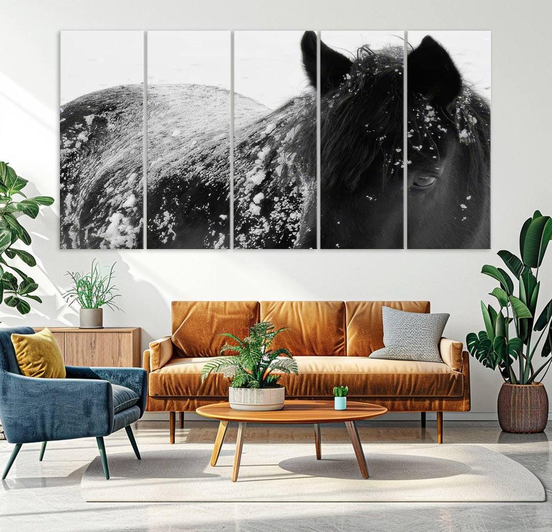 The "Black Horse in Snow Canvas Print" serves as an ideal rustic cabin wall art centerpiece with its triptych design of a snowy black horse.