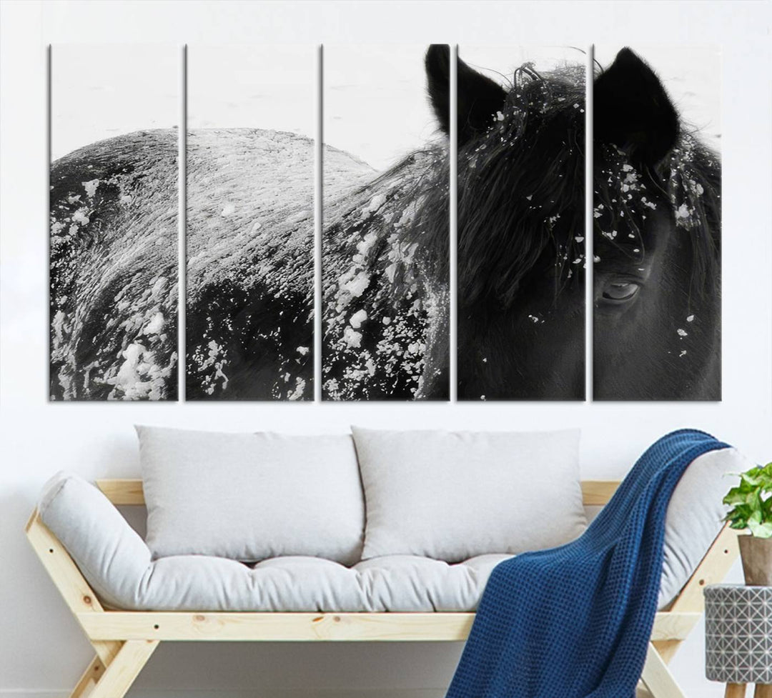 The "Black Horse in Snow Canvas Print" serves as an ideal rustic cabin wall art centerpiece with its triptych design of a snowy black horse.