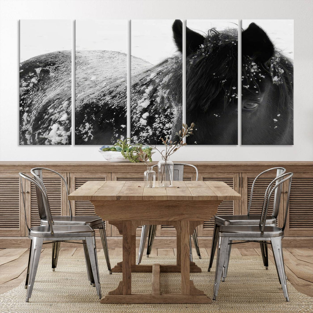 The "Black Horse in Snow Canvas Print" serves as an ideal rustic cabin wall art centerpiece with its triptych design of a snowy black horse.