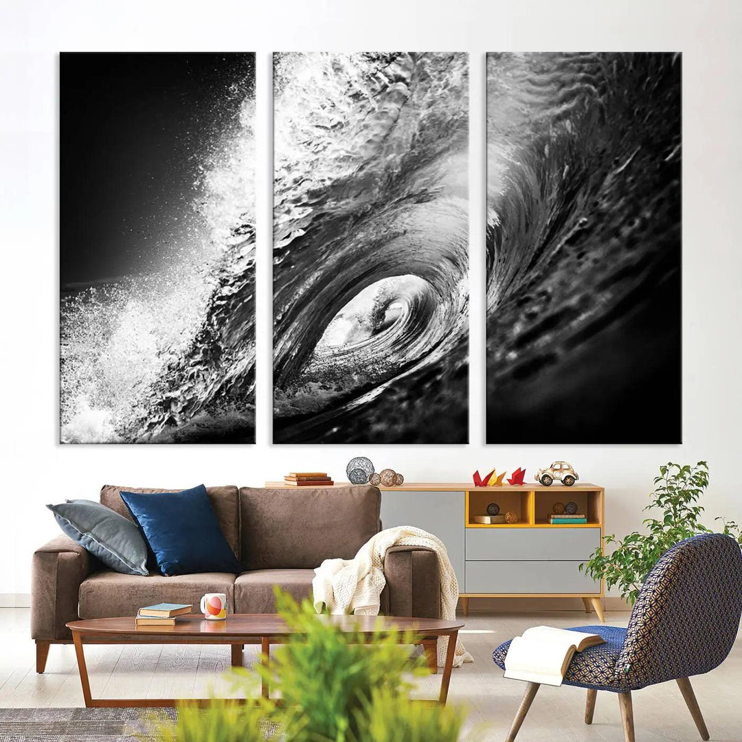 A three-panel display of the "Black Ocean Wave at Sunset Canvas Art" features a vibrant depiction of water waves in black and white, perfectly capturing the coastal ambiance.