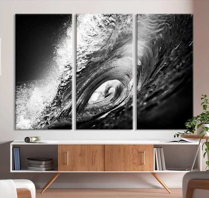 A three-panel display of the "Black Ocean Wave at Sunset Canvas Art" features a vibrant depiction of water waves in black and white, perfectly capturing the coastal ambiance.