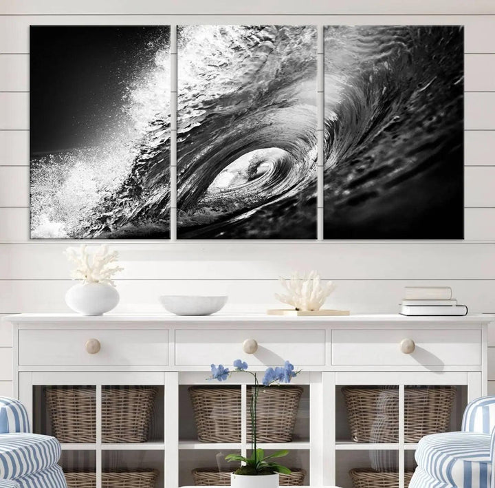 A three-panel display of the "Black Ocean Wave at Sunset Canvas Art" features a vibrant depiction of water waves in black and white, perfectly capturing the coastal ambiance.