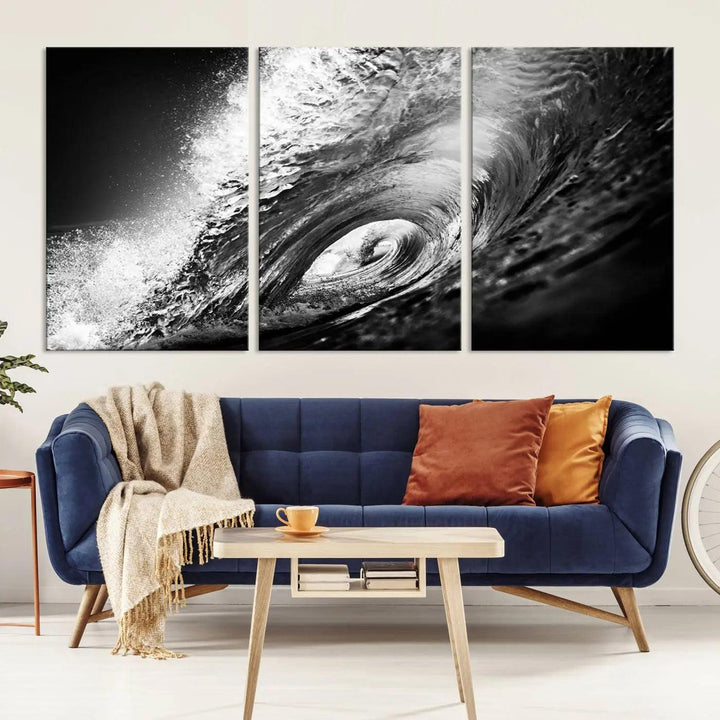 A three-panel display of the "Black Ocean Wave at Sunset Canvas Art" features a vibrant depiction of water waves in black and white, perfectly capturing the coastal ambiance.