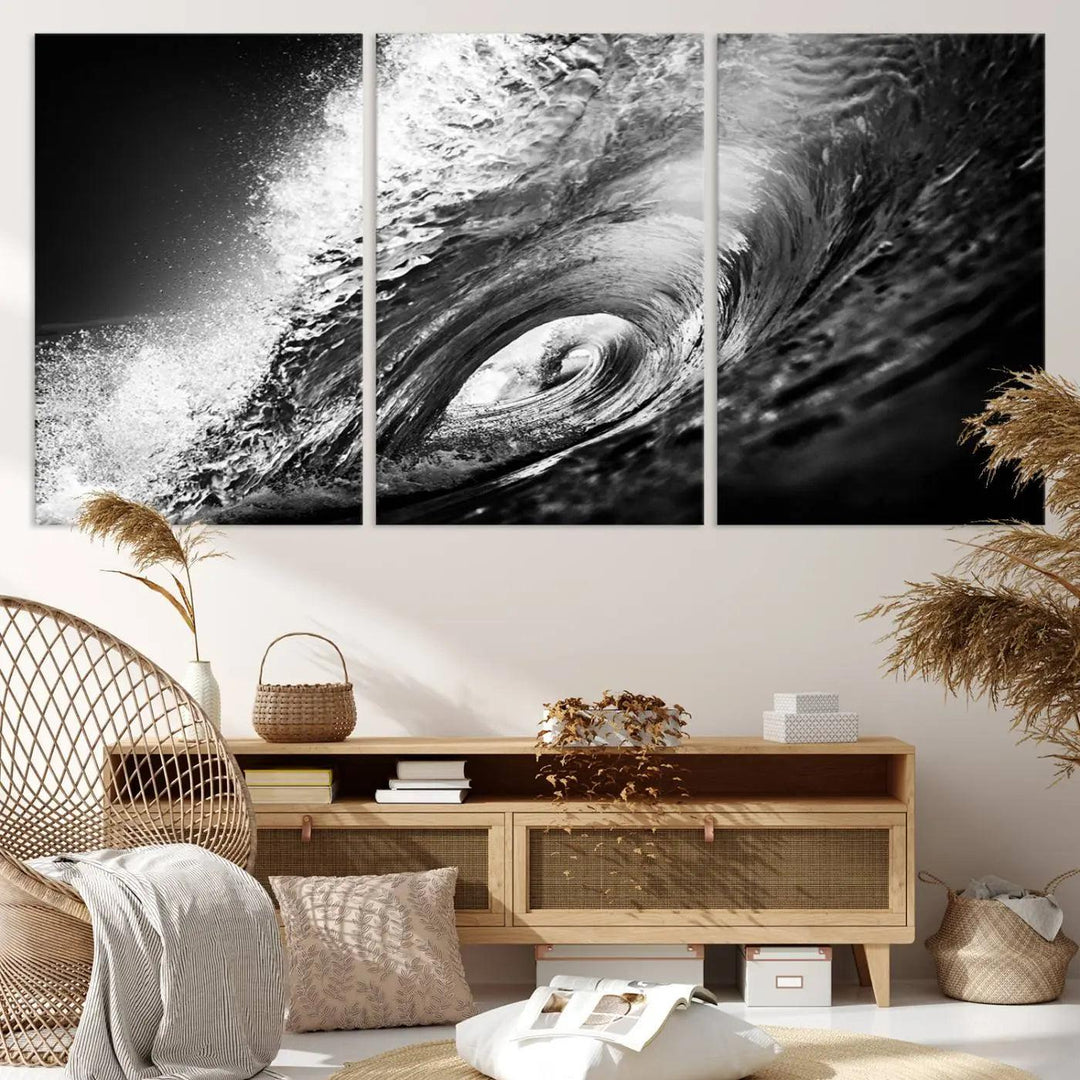 A three-panel display of the "Black Ocean Wave at Sunset Canvas Art" features a vibrant depiction of water waves in black and white, perfectly capturing the coastal ambiance.