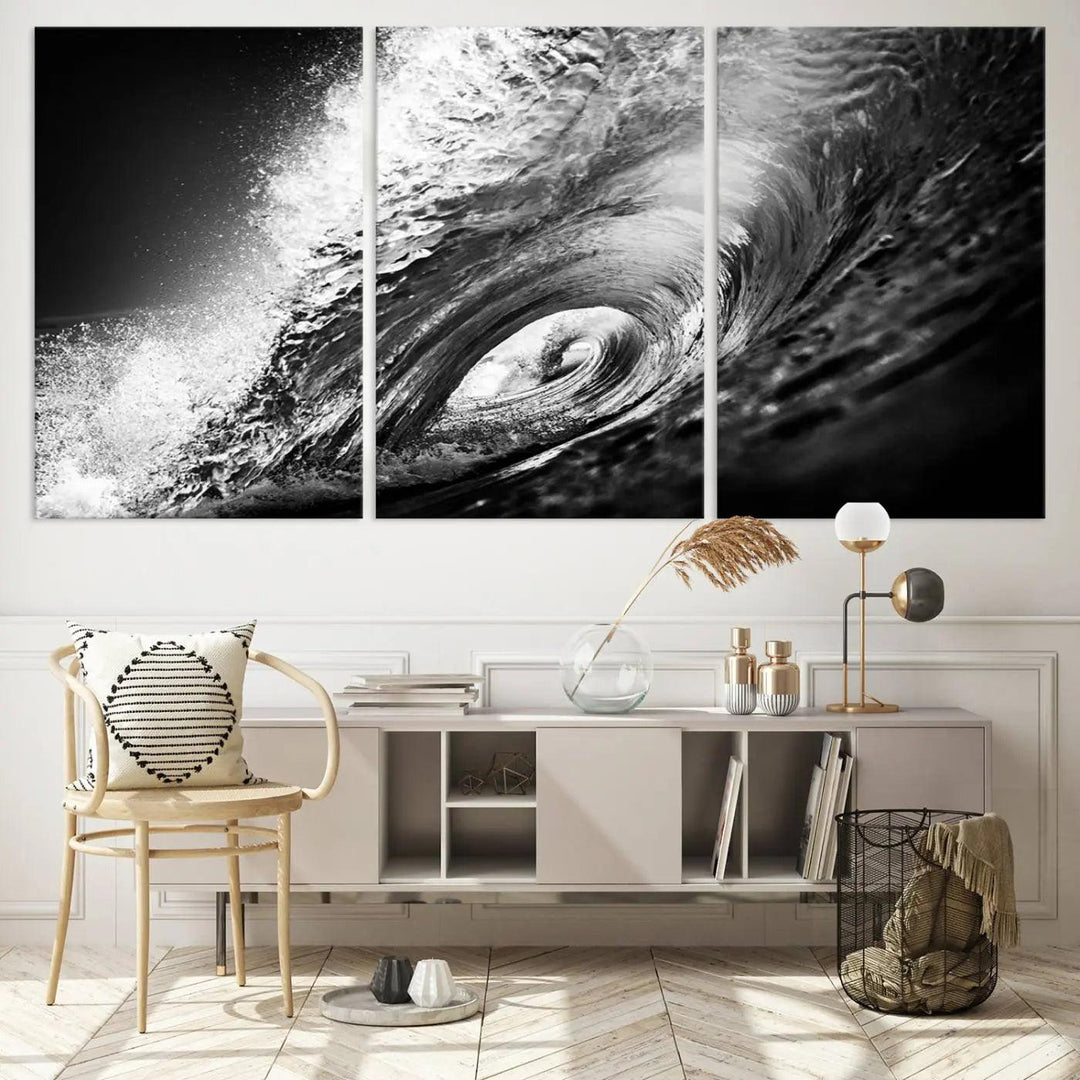 A three-panel display of the "Black Ocean Wave at Sunset Canvas Art" features a vibrant depiction of water waves in black and white, perfectly capturing the coastal ambiance.