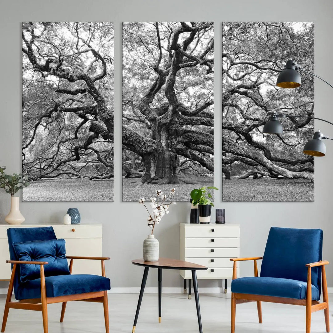 The timeless nature-inspired Black White Angel Oak Tree Wall Art beautifully adorns a modern living room as a triptych. Creating a harmonious blend of style and serenity, this piece elegantly infuses the space with its striking imagery.