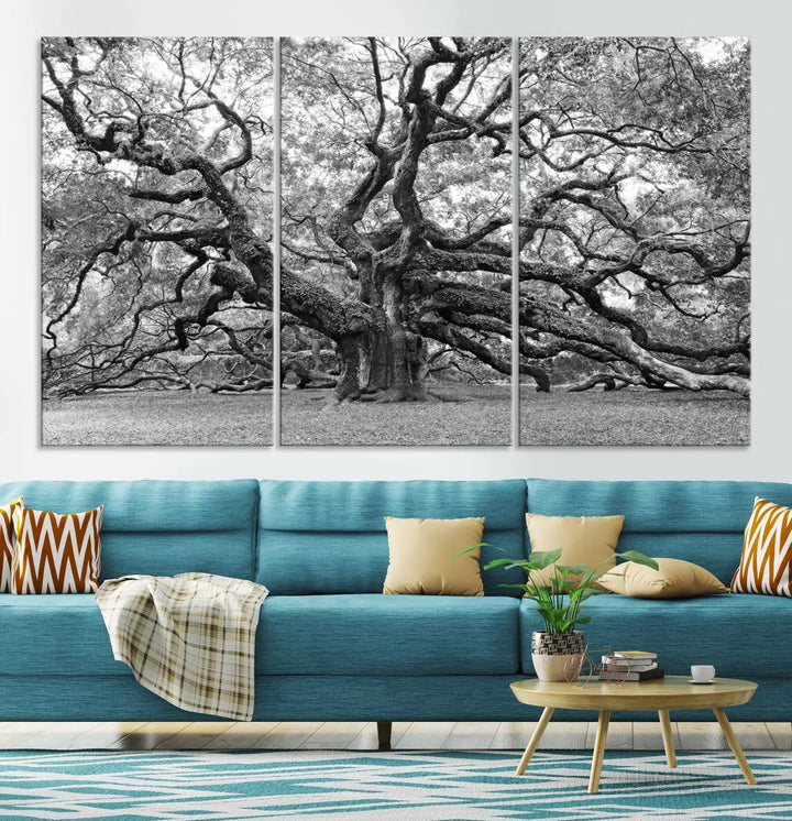 The timeless nature-inspired Black White Angel Oak Tree Wall Art beautifully adorns a modern living room as a triptych. Creating a harmonious blend of style and serenity, this piece elegantly infuses the space with its striking imagery.