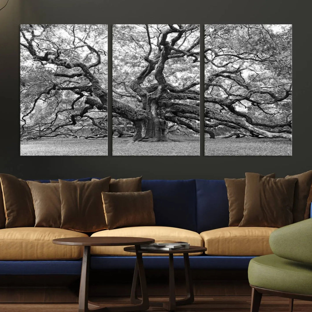 The timeless nature-inspired Black White Angel Oak Tree Wall Art beautifully adorns a modern living room as a triptych. Creating a harmonious blend of style and serenity, this piece elegantly infuses the space with its striking imagery.