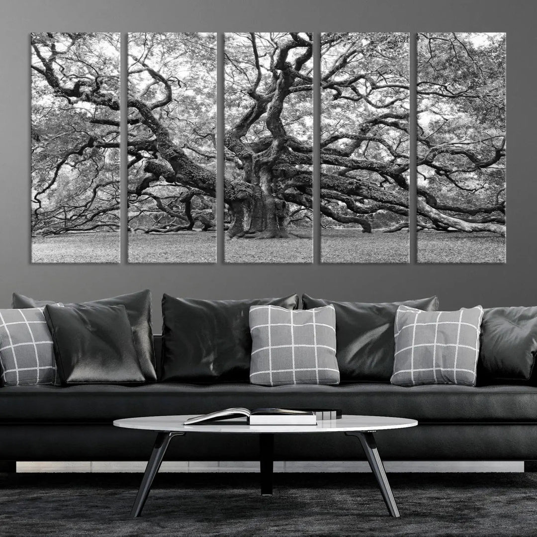 The timeless nature-inspired Black White Angel Oak Tree Wall Art beautifully adorns a modern living room as a triptych. Creating a harmonious blend of style and serenity, this piece elegantly infuses the space with its striking imagery.