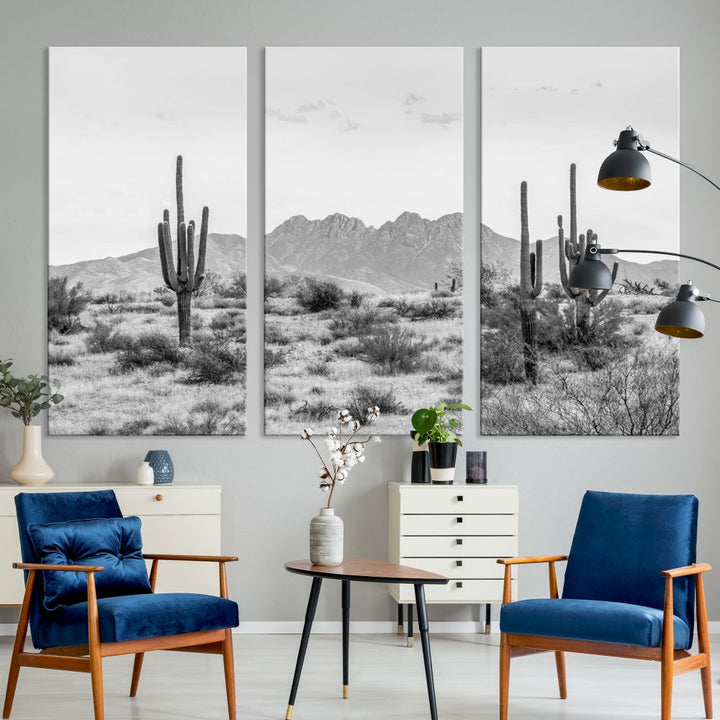 The modern living room showcases the "Black White Arizona Desert Canvas Wall Art Cactus Farmhouse Wall Art," a triptych consisting of gallery-wrapped, museum-quality black-and-white desert landscape photographs featuring cacti.