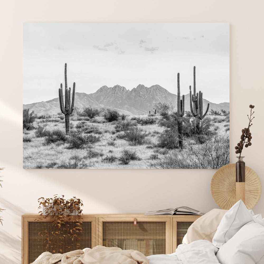 The modern living room showcases the "Black White Arizona Desert Canvas Wall Art Cactus Farmhouse Wall Art," a triptych consisting of gallery-wrapped, museum-quality black-and-white desert landscape photographs featuring cacti.