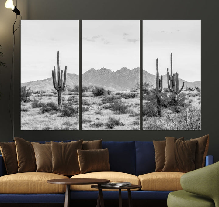 The modern living room showcases the "Black White Arizona Desert Canvas Wall Art Cactus Farmhouse Wall Art," a triptych consisting of gallery-wrapped, museum-quality black-and-white desert landscape photographs featuring cacti.